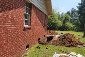digging holes for foundation repair